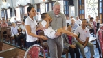 Caritas BC đón đoàn trao xe lăn người khuyết tật