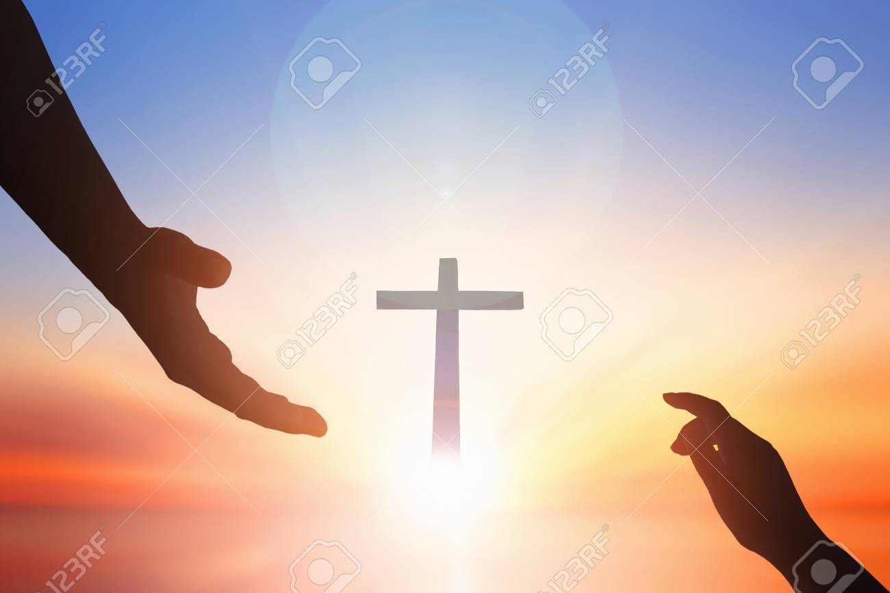 112652488 jesus helping hand concept world peace day and help hand on sunset background