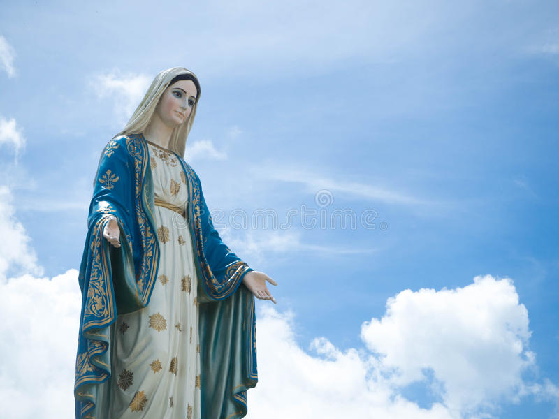 blessed virgin mary statue blue sky background 95517238